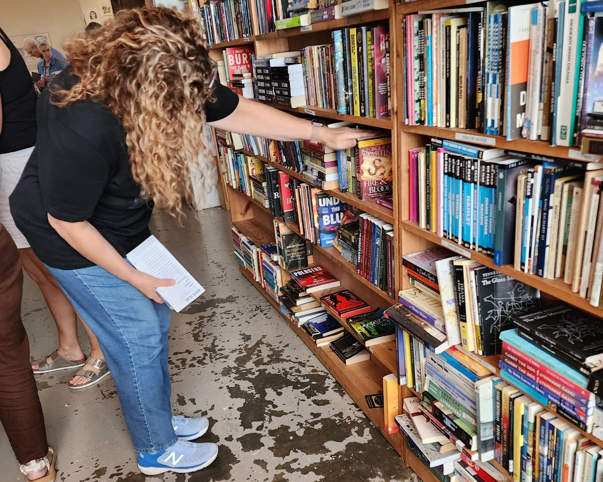 M.V. Despenza volunteering at Big House Books in Mississippi. 